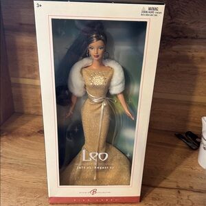 Barbie Leo Doll in Sparkling Gold Dress
